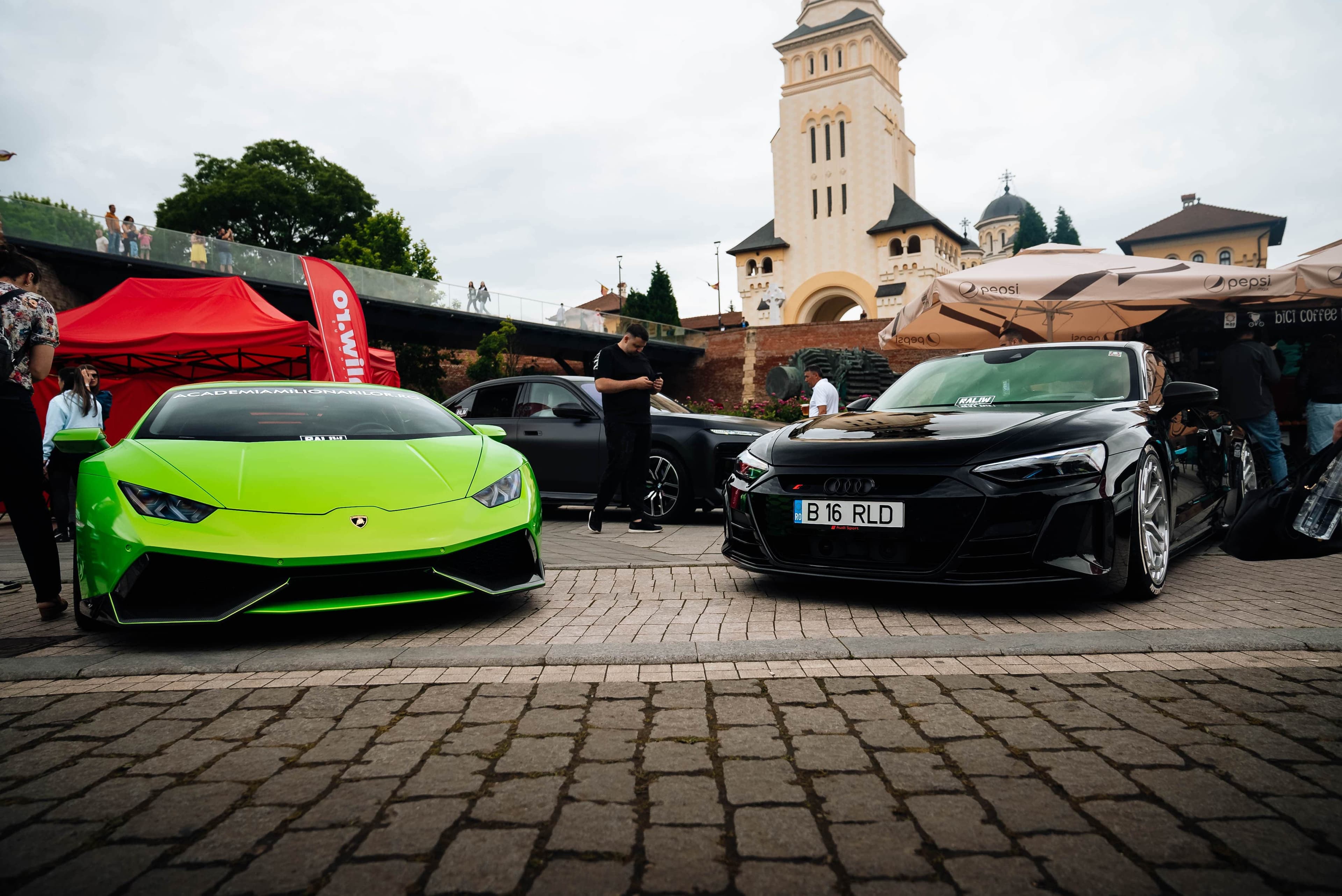 a Huracan and an E-Tron RS